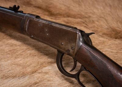 Photo of fire damaged Winchester Model 1894 Deluxe Takedown, a candidate for firearm restoration