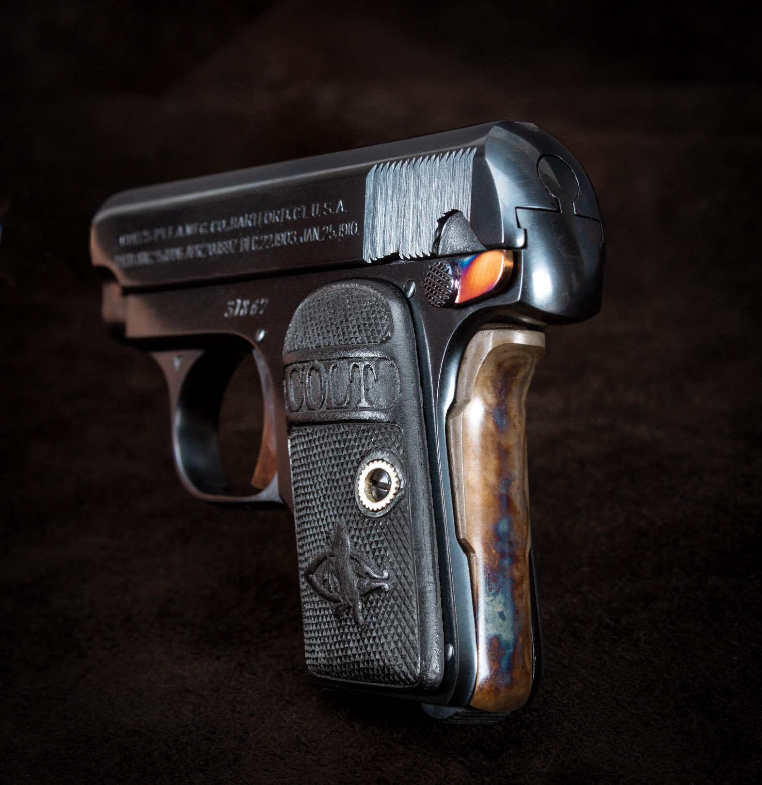Photo of a restored Colt 1908 Vest Pocket, restored by Turnbull Restoration and featuring period-correct metal finishes including color case hardening and charcoal bluing
