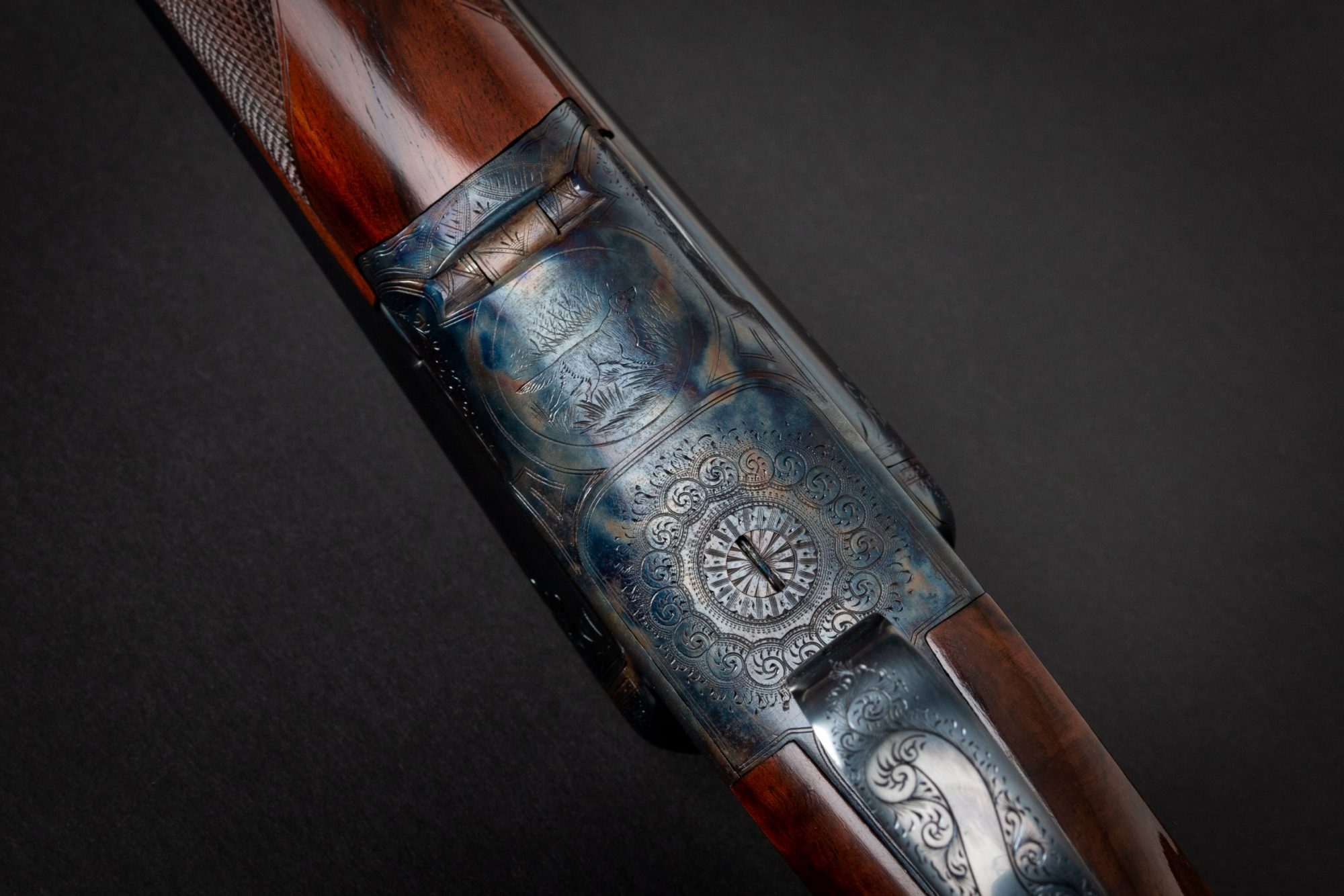 Photo of a restored A.H. Fox CE 20 gauge shotgun, featuring color case hardening by Turnbull Restoration