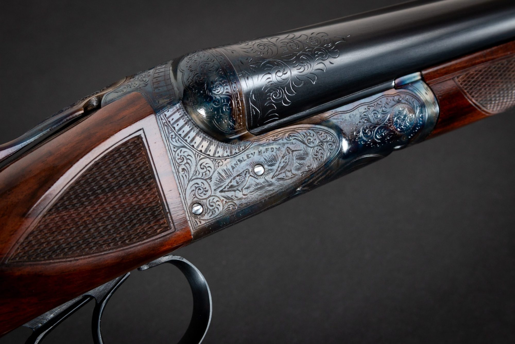 Photo of a restored A.H. Fox CE 20 gauge shotgun, featuring color case hardening by Turnbull Restoration