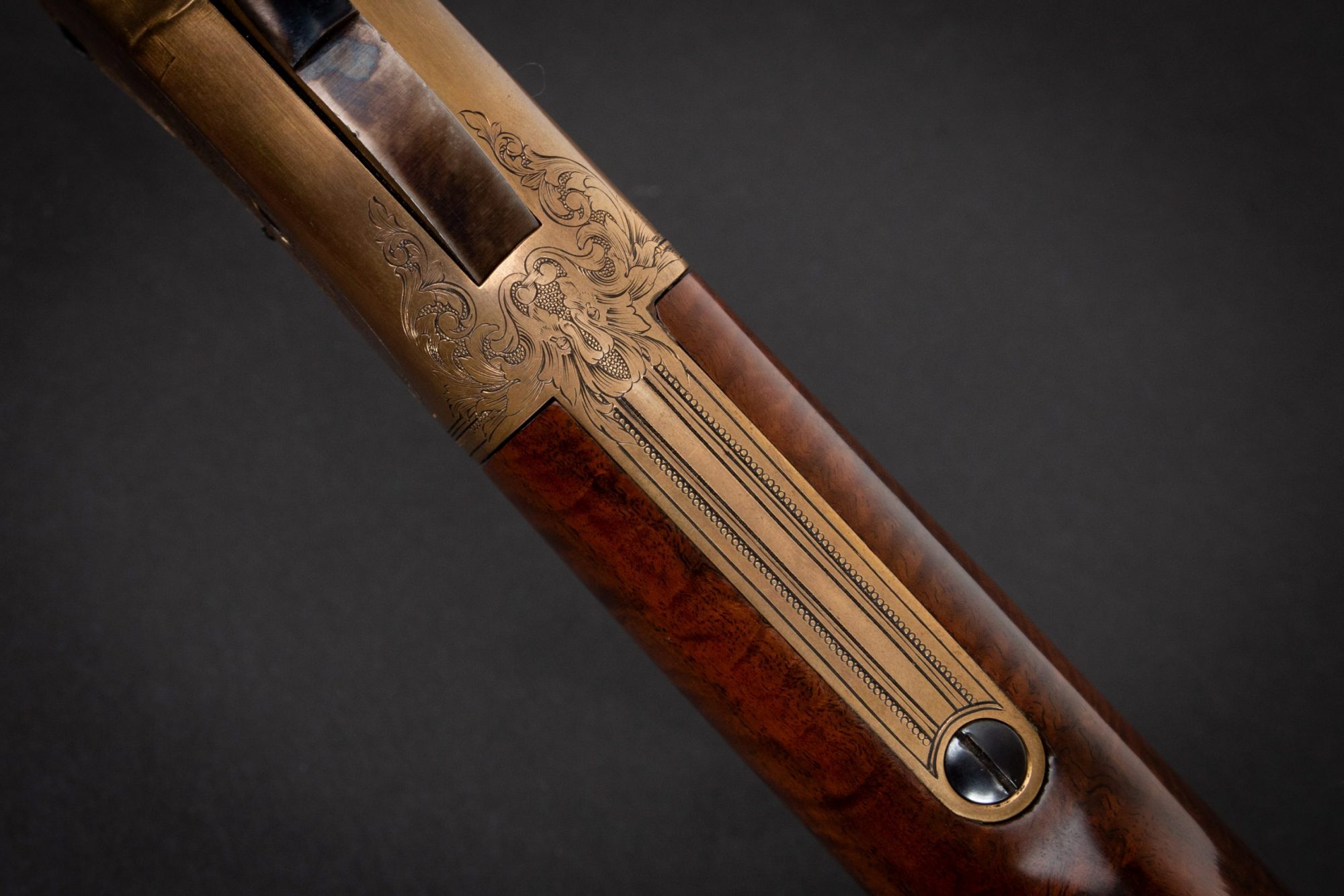 Close-up photo of a Navy Arms A. Uberti 1860 Henry, Engraved by FEGA Master Lee Griffiths, sold as-is by Turnbull Restoration