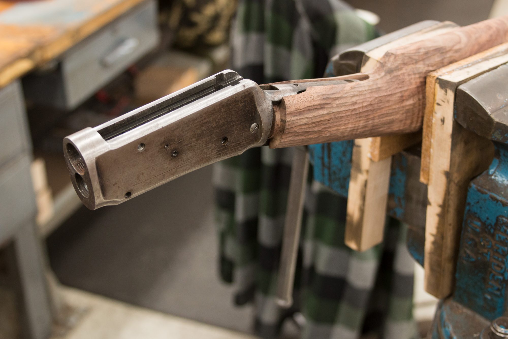 Photo of a Winchester 1894 restoration in progress, focusing on receiver inletting