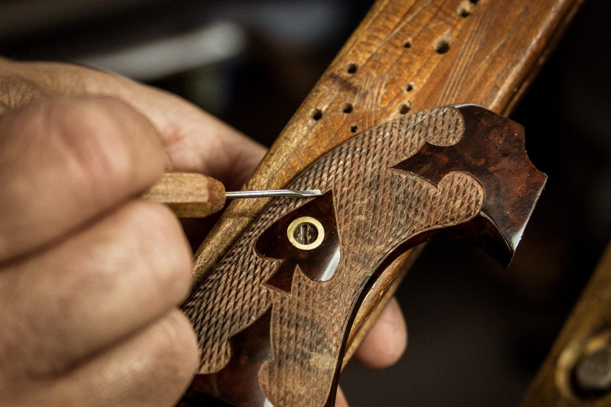 Photo of grip checkering, part of a full gun restoration performed on a Colt Bisley by Turnbull Restoration