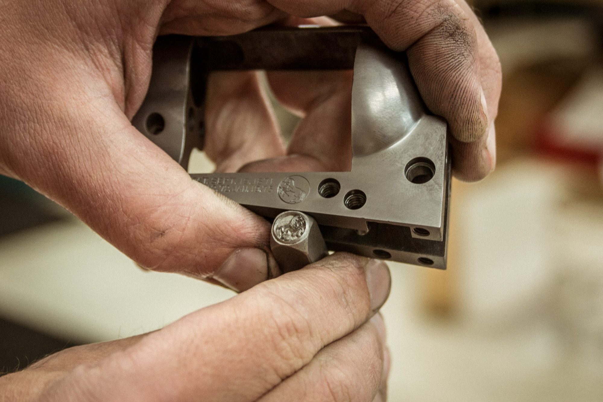 Photo of frame stamping with Colt marking, part of a full gun restoration performed on a Colt Bisley by Turnbull Restoration