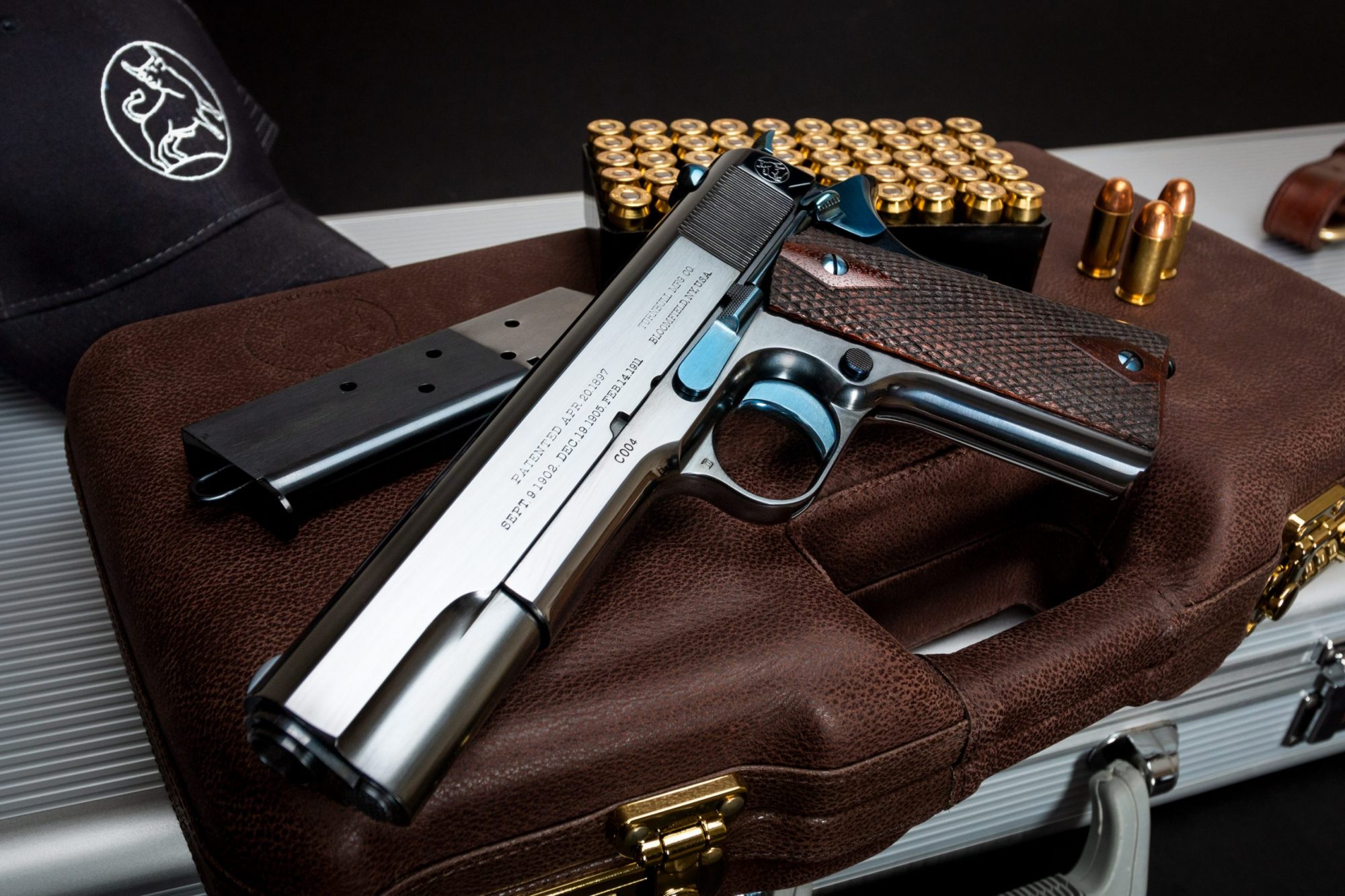 Photo of a new, Turnbull-manufactured Commercial Model 1911 featuring period-correct charcoal bluing and nitre bluing