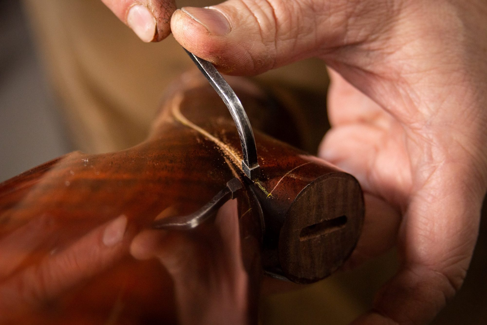 Photo of wood checkering on a restored Winchester Model 71