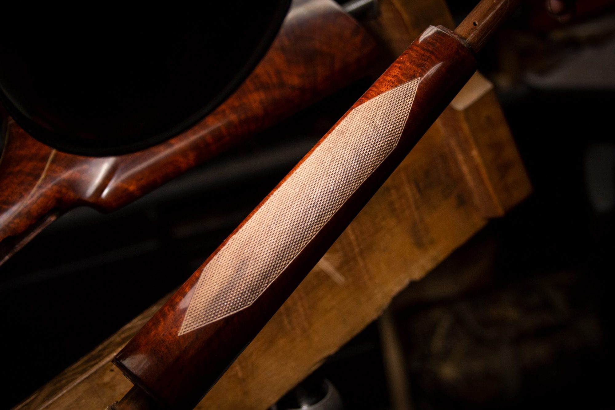 Photo of wood checkering on a restored Winchester Model 71