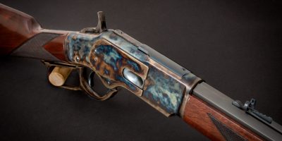 Photo of a Turnbull Finished Winchester 1873 Deluxe Sporter, featuring bone charcoal color case hardening