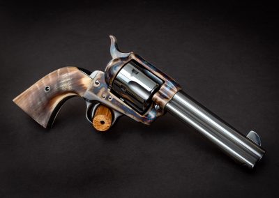 Photo of a 3rd Generation Colt SAA revolver, with custom grips, 1st Generation cylinder conversion, and restoration grade metal finishes by Turnbull Restoration of Bloomfield, NY