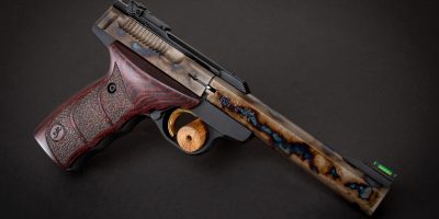 Photo of a Turnbull Finished Browning Buck Mark pistol in .22LR, featuring bone charcoal color case hardening by Turnbull Restoration of Bloomfield, NY