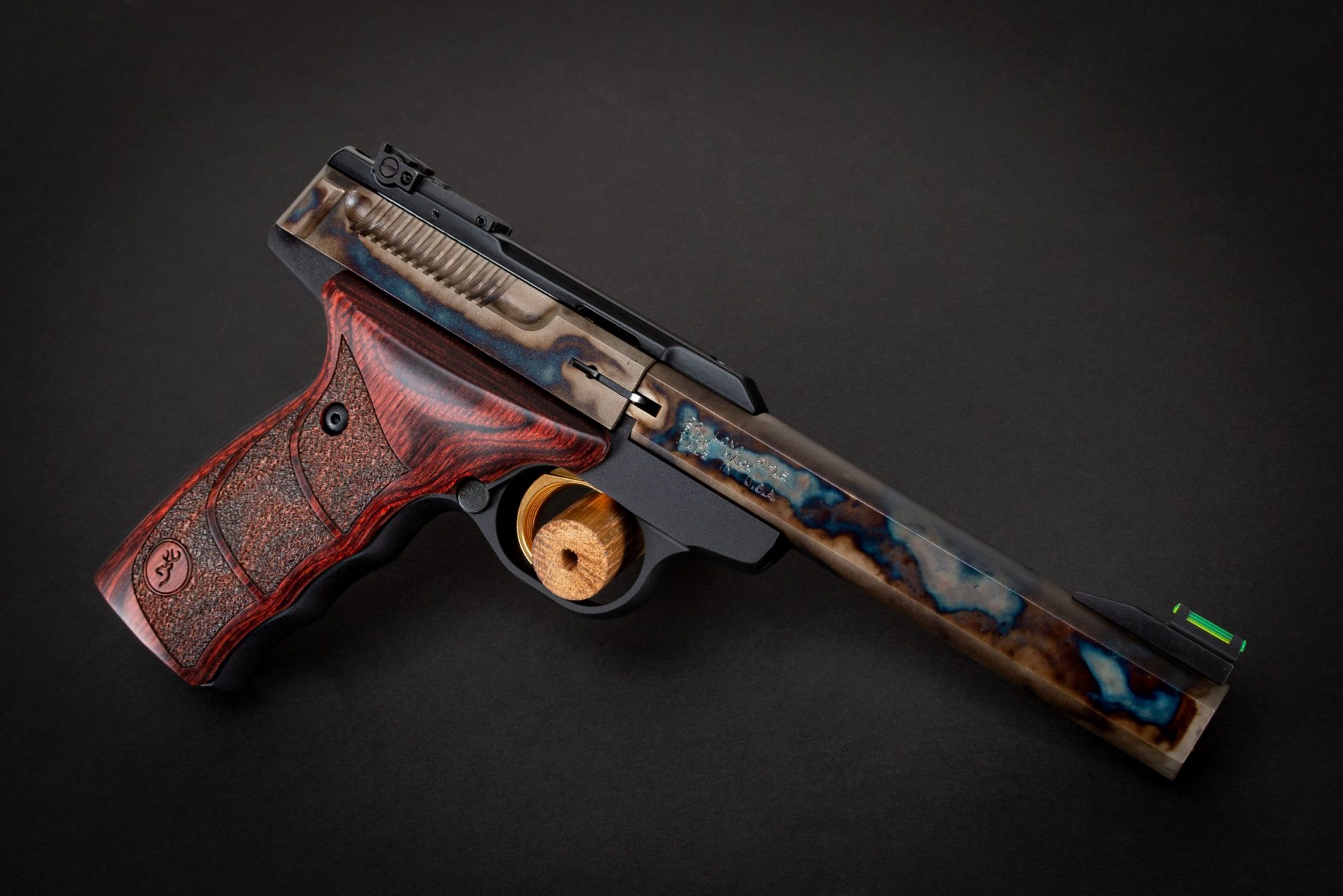 Photo of a Turnbull Finished Browning Buck Mark pistol in .22LR, featuring bone charcoal color case hardening by Turnbull Restoration of Bloomfield, NY