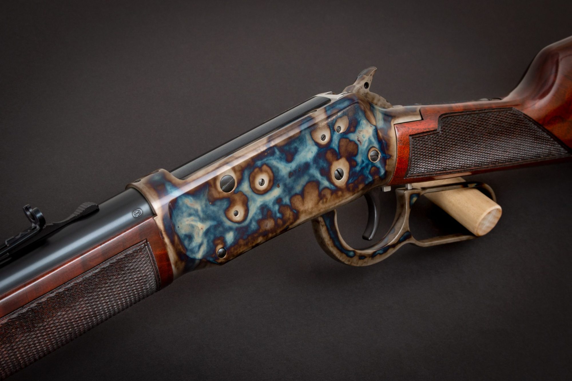 Photo of a refinished Winchester Model 1894 - The Turnbull Winchester 1894 features classic era metal finishes including bone charcoal color case hardening and refinished wood in Winchester red