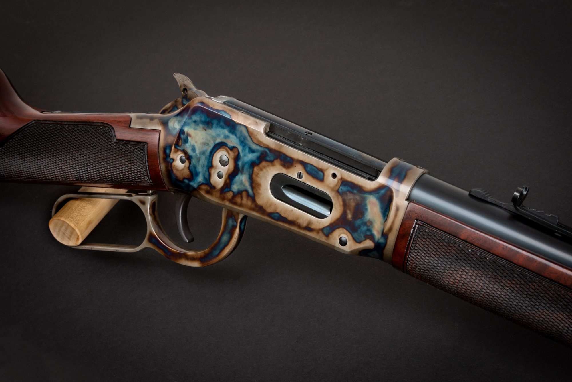 Photo of a refinished Winchester Model 1894 - The Turnbull Winchester 1894 features classic era metal finishes including bone charcoal color case hardening and refinished wood in Winchester red