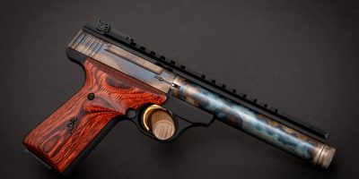 Photo of a color case hardened Browning Buck Mark Field Target with threaded barrel, featuring bone charcoal color case hardening by Turnbull Restoration of Bloomfield, NY