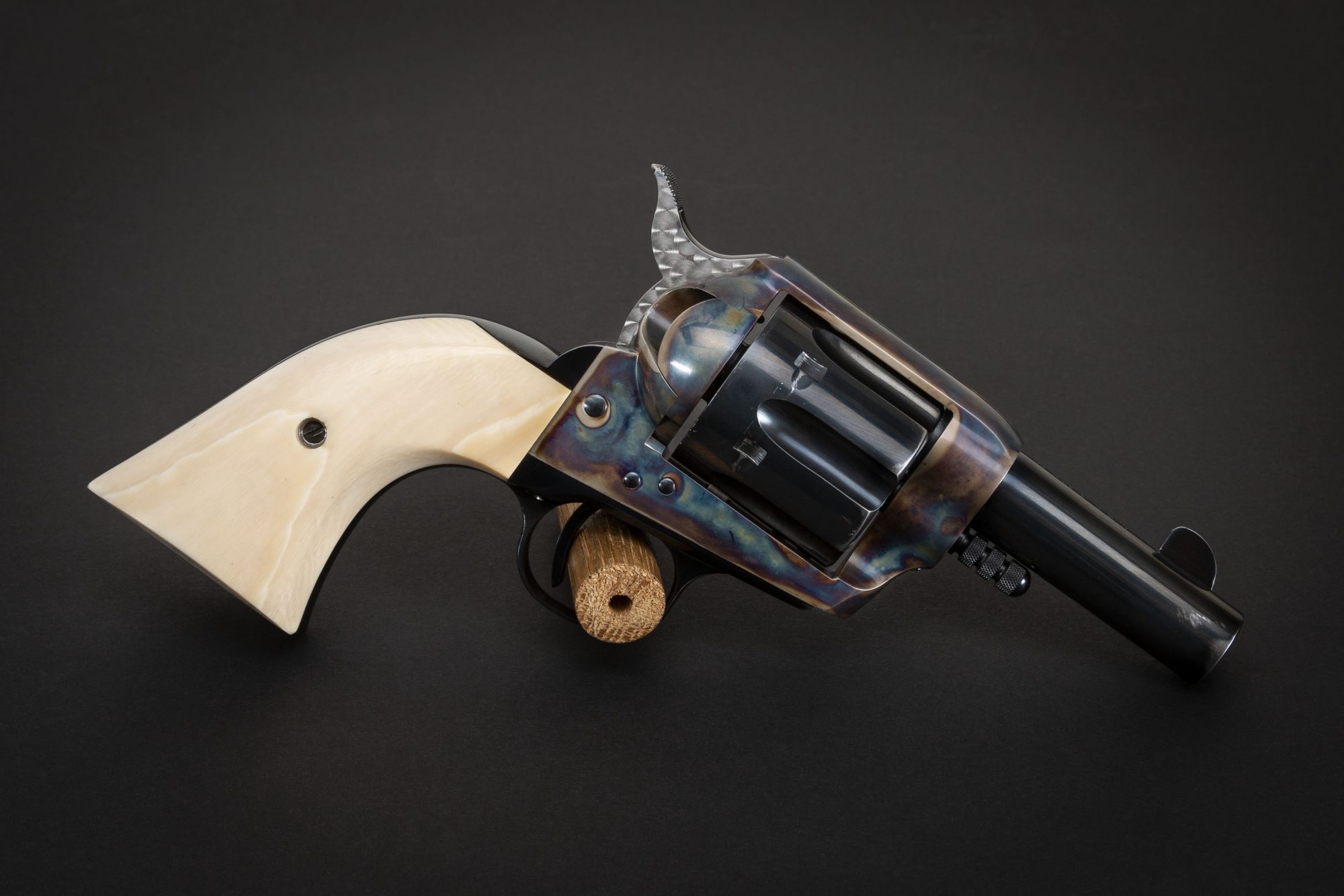 Photo of a U.S. Fire Arms (USFA) Single Action Sheriff Model Revolver featuring bone charcoal color case hardening by Turnbull Restoration of Bloomfield, NY