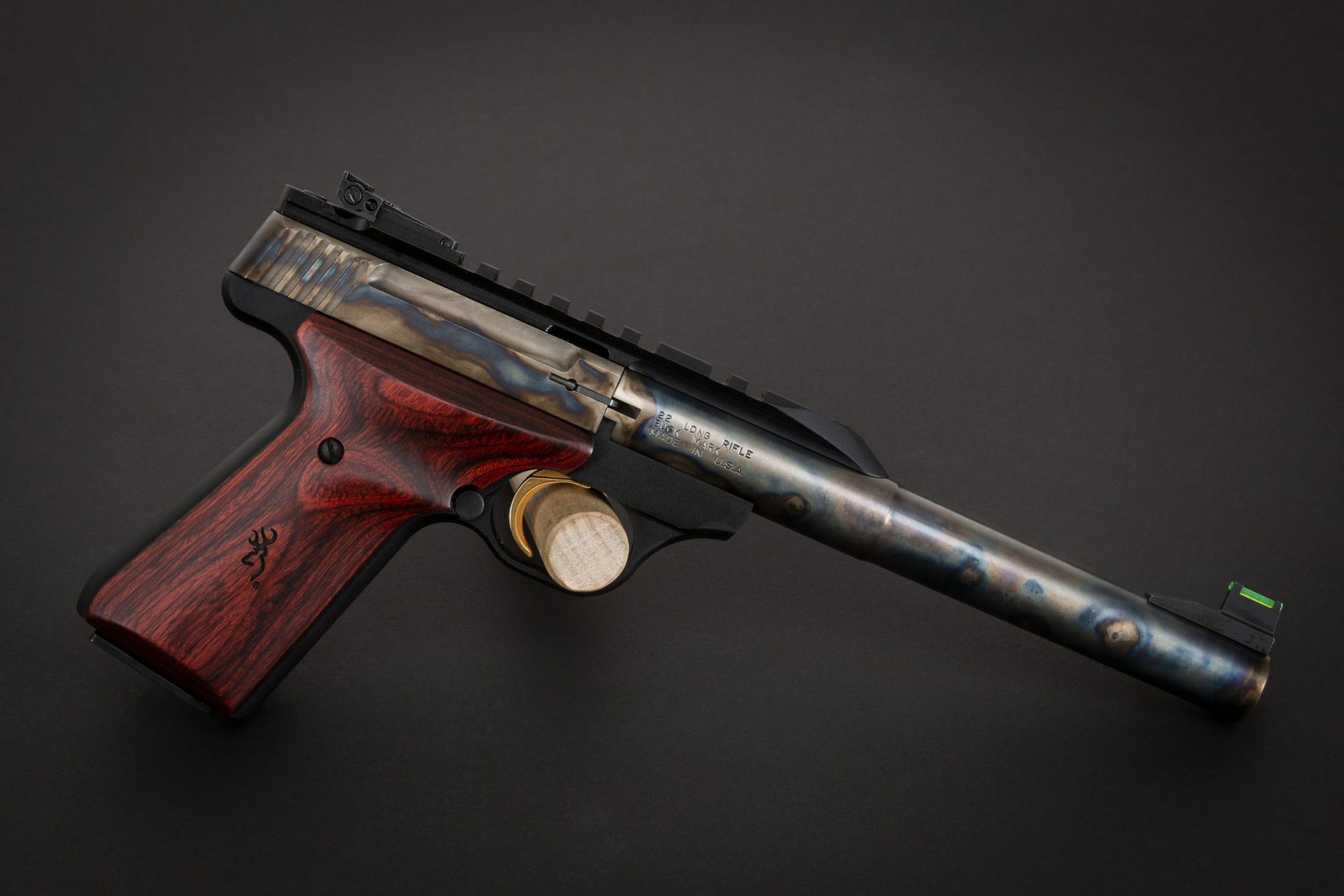 Photo of a color case hardened Browning Buck Mark Hunter pistol, featuring bone charcoal color case hardening by Turnbull Restoration of Bloomfield, NY