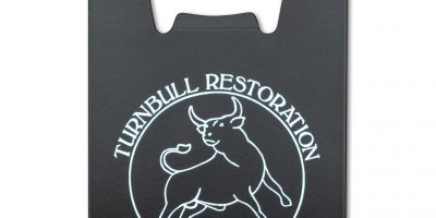 Photo of a Turnbull Restoration branded credit card bottle opener, part of Turnbull Restoration's barware collection