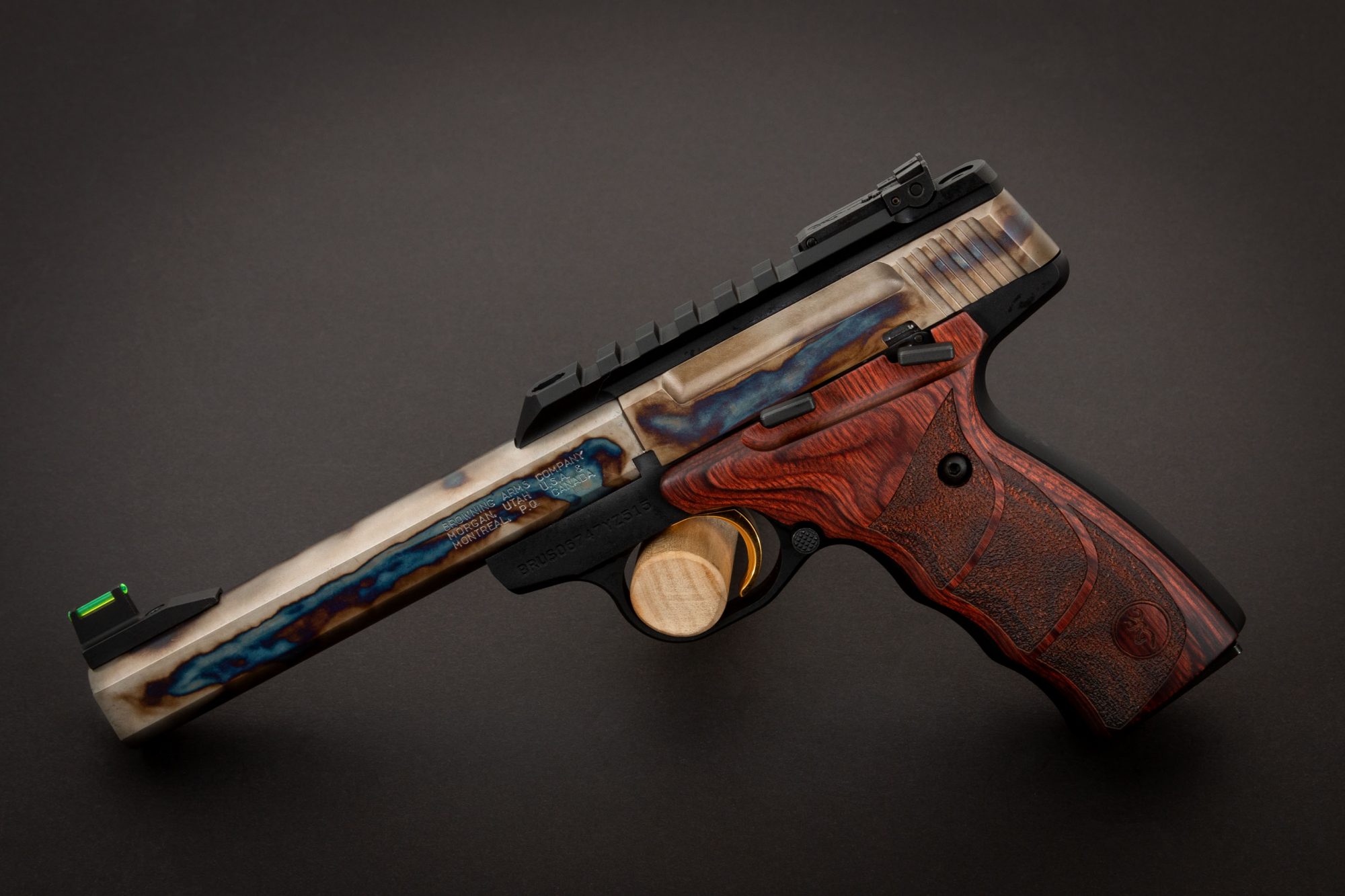 Photo of a color case hardened Browning Buck Mark pistol, featuring bone charcoal color case hardening by Turnbull Restoration of Bloomfield, NY