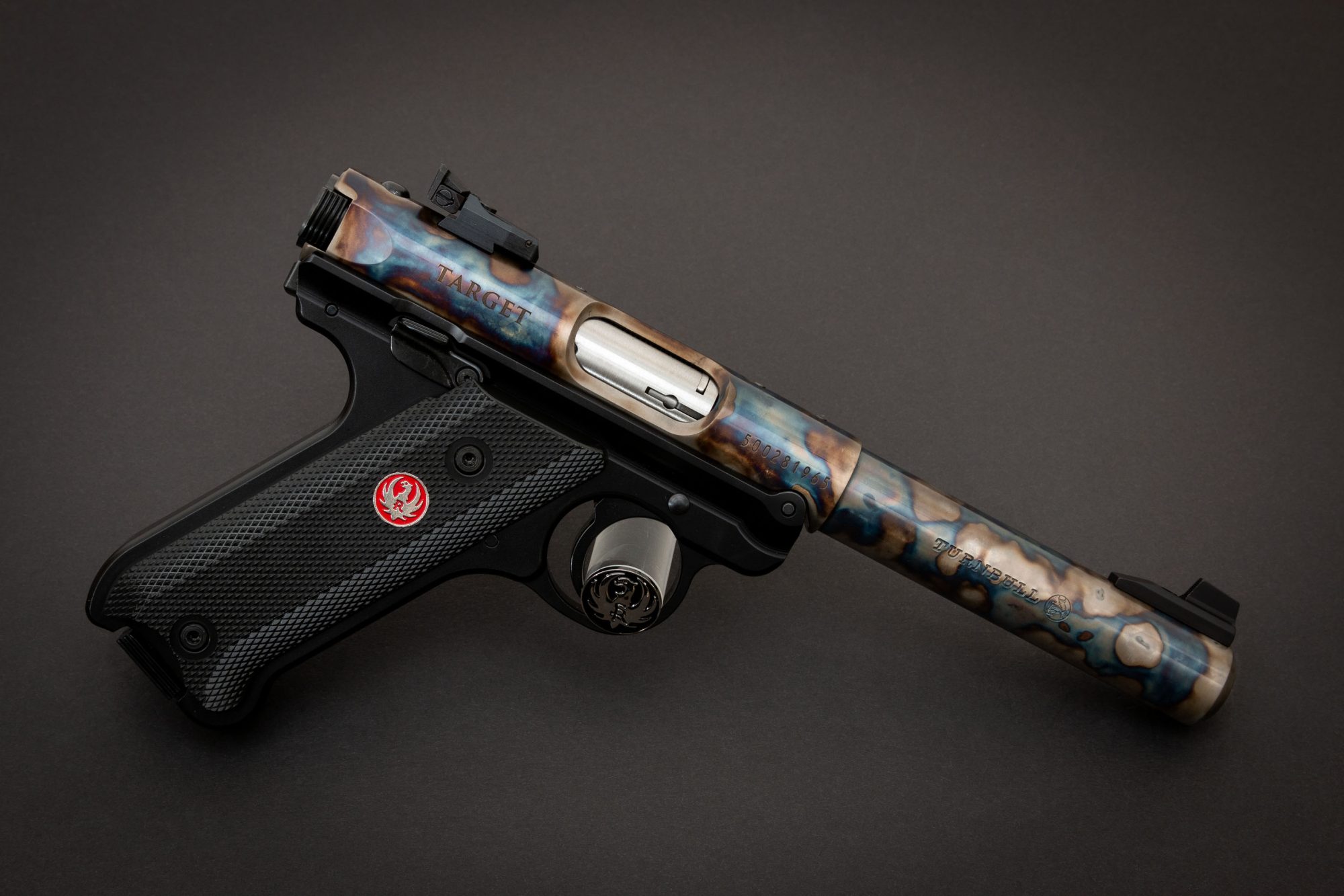 Photo of a color case hardened Ruger Mark IV Target suppressor-ready pistol, featuring bone charcoal color case hardening by Turnbull Restoration of Bloomfield, NY
