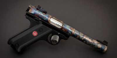 Photo of a color case hardened Ruger Mark IV Target suppressor-ready pistol, featuring bone charcoal color case hardening by Turnbull Restoration of Bloomfield, NY