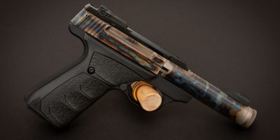 Photo of a color case hardened Browning Buck Mark Micro Bull Suppressor Ready pistol, featuring bone charcoal color case hardening by Turnbull Restoration of Bloomfield, NY