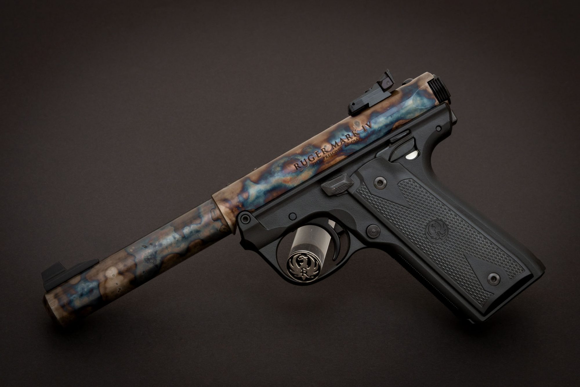 Photo of a color case hardened Ruger Mark IV 22/45 pistol, featuring bone charcoal color case hardening by Turnbull Restoration of Bloomfield, NY