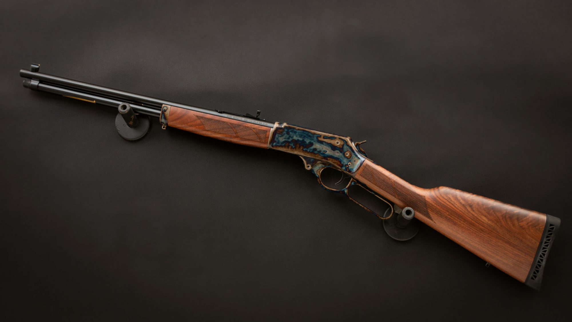 Photo of a color case hardened Henry H009G Steel Lever Action Side Gate rifle, featuring bone charcoal color case hardening by Turnbull Restoration of Bloomfield, NY