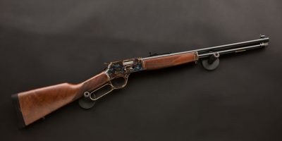 Photo of a color case hardened Henry H012G Big Boy Steel Side Gate rifle, featuring bone charcoal color case hardening by Turnbull Restoration of Bloomfield, NY