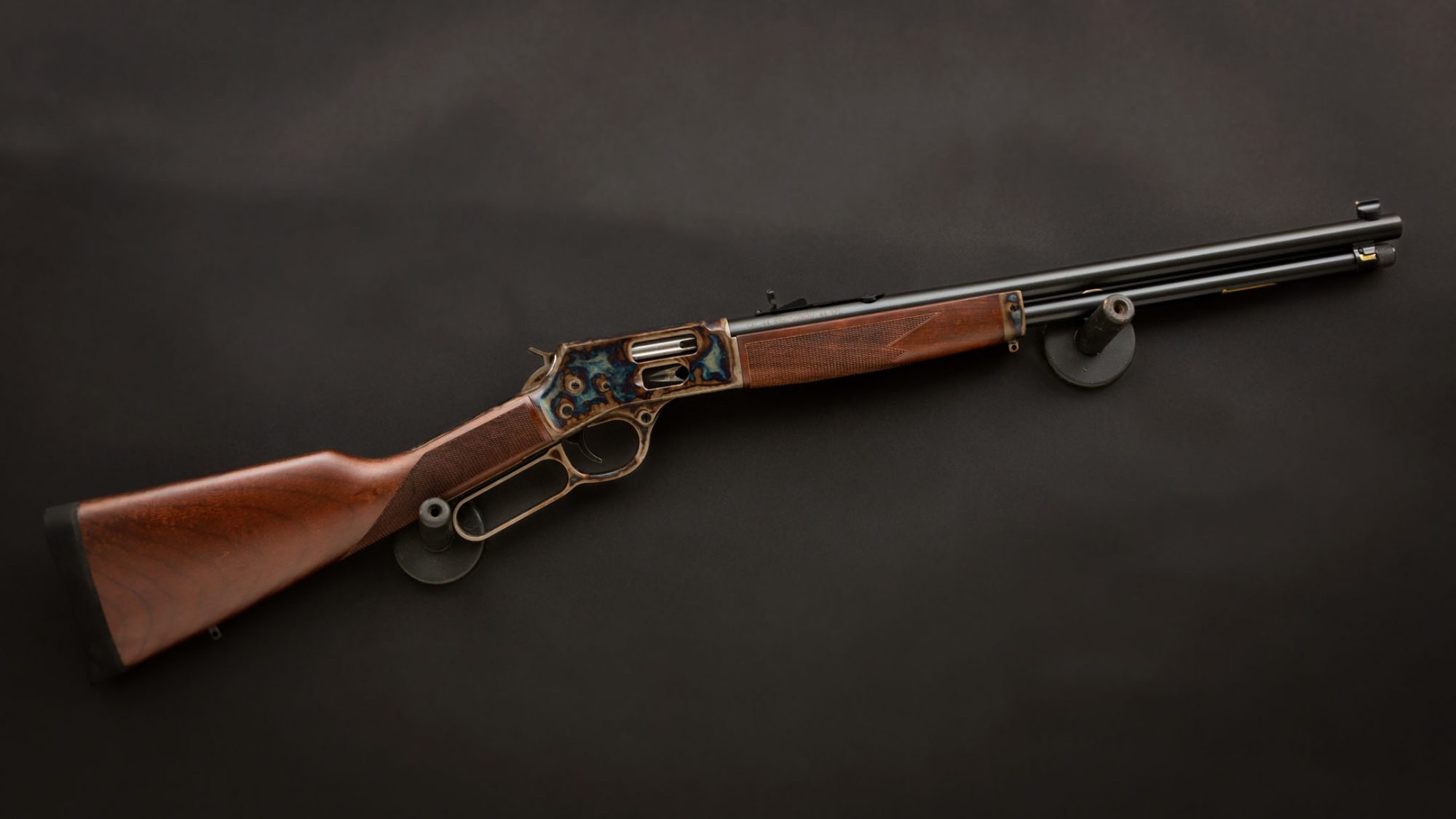 Photo of a color case hardened Henry H012G Big Boy Steel Side Gate rifle, featuring bone charcoal color case hardening by Turnbull Restoration of Bloomfield, NY