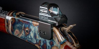 Photo of a red dot mount for Trijicon RMR, Holosun, and other red dot reflex sights, made by Turnbull Restoration for Winchester Model 71 and Model 1886 lever action rifle receivers