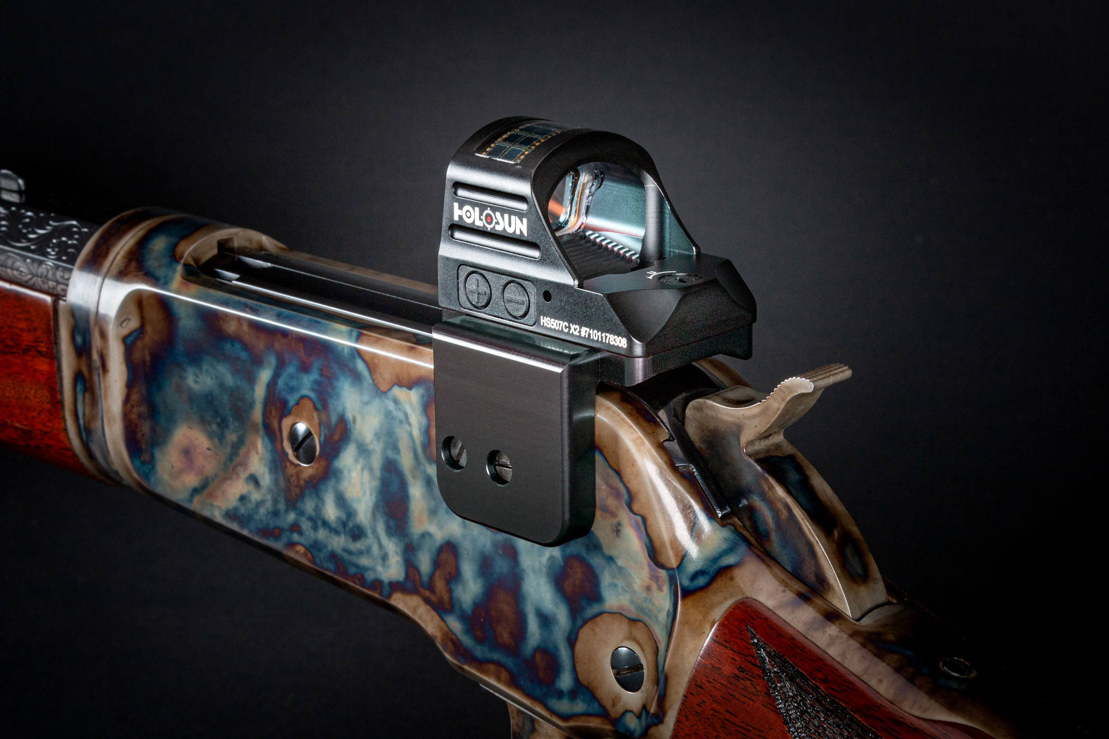 Photo of a red dot mount for Trijicon RMR, Holosun, and other red dot reflex sights, made by Turnbull Restoration for Winchester Model 71 and Model 1886 lever action rifle receivers