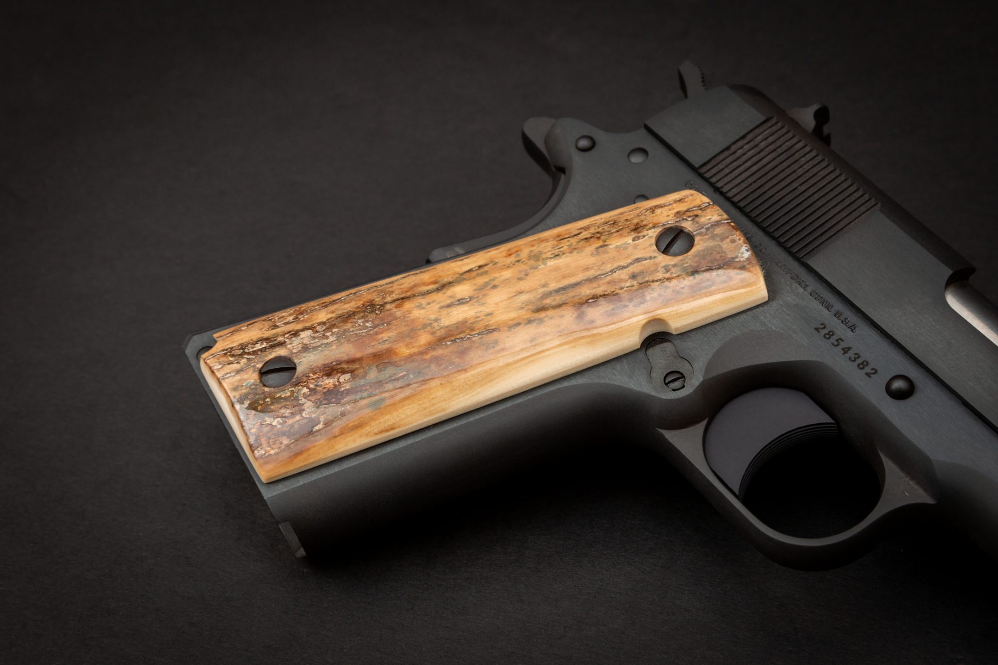 Photo of a Colt Government Model 1911 with custom grips, for sale by Turnbull Restoration of Bloomfield, NY