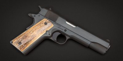 Photo of a Colt Government Model 1911 with custom grips, for sale by Turnbull Restoration of Bloomfield, NY