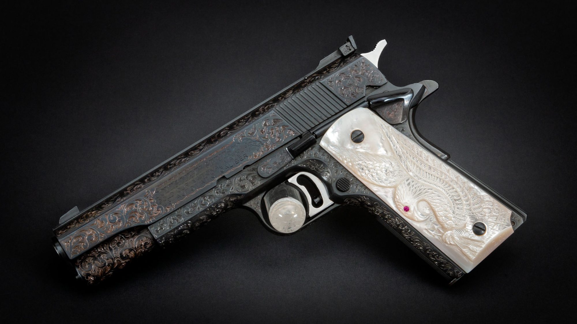 Photo of a Colt 1911 Gold Cup National Match pistol engraved by Ralph W. Ingle, for sale by Turnbull Restoration of Bloomfield, NY