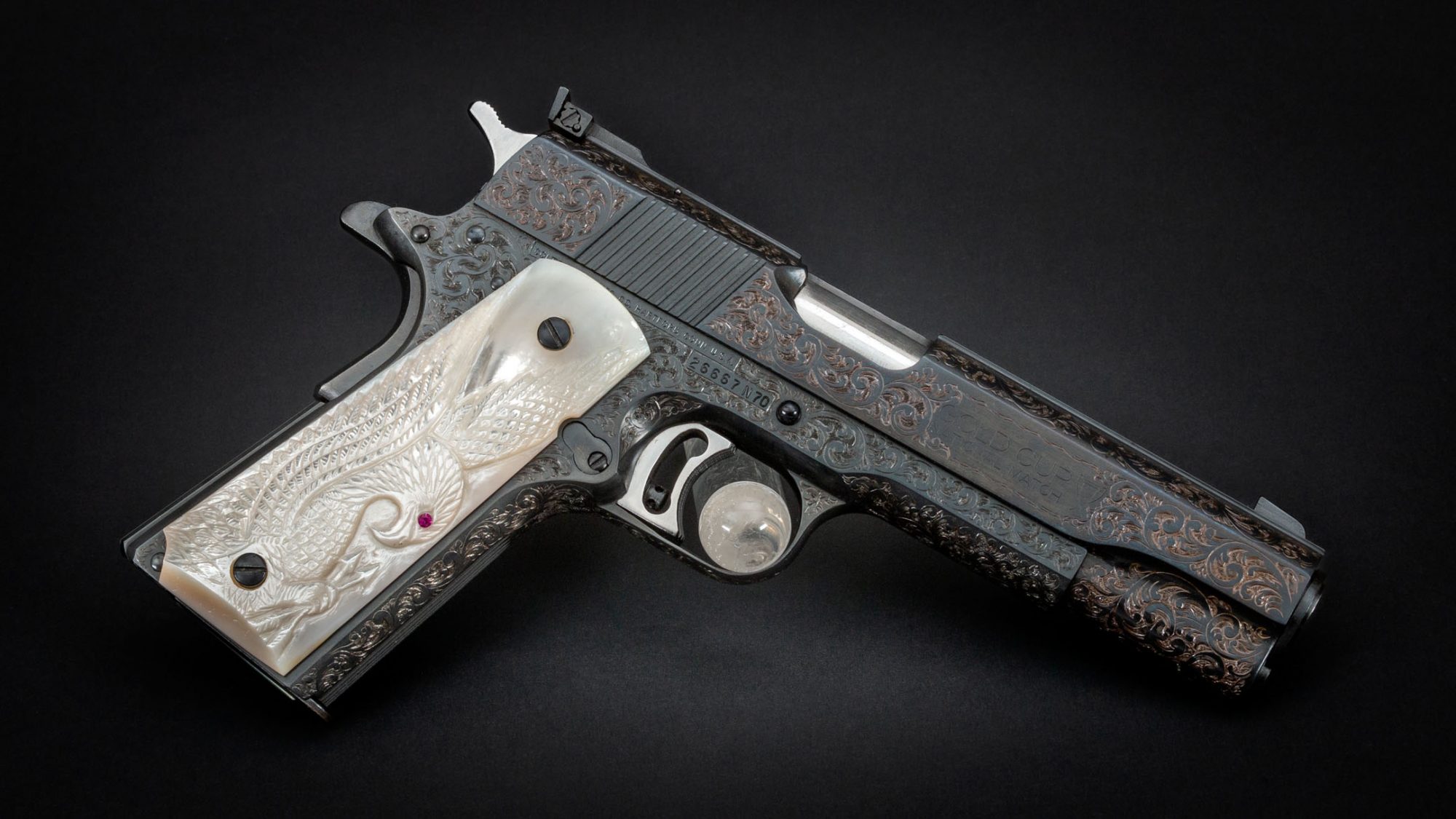 Photo of a Colt 1911 Gold Cup National Match pistol engraved by Ralph W. Ingle, for sale by Turnbull Restoration of Bloomfield, NY