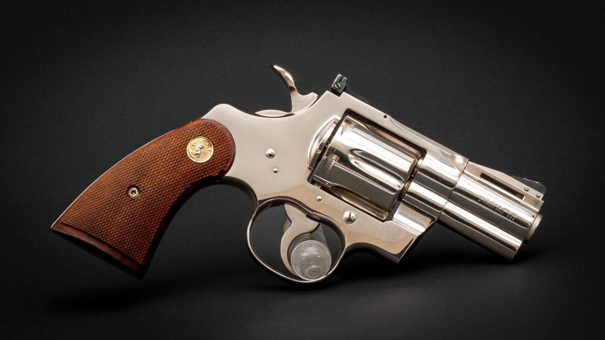 Photo of a nickel plated Colt Python revolver, for sale by Turnbull Restoration of Bloomfield, NY
