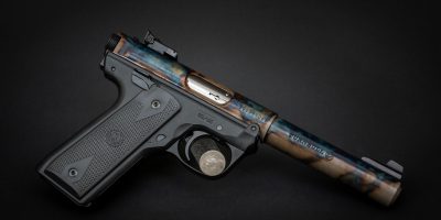 Photo of a color case hardened Ruger Mark IV 22/45 pistol, featuring bone charcoal color case hardening by Turnbull Restoration Co. of Bloomfield, NY