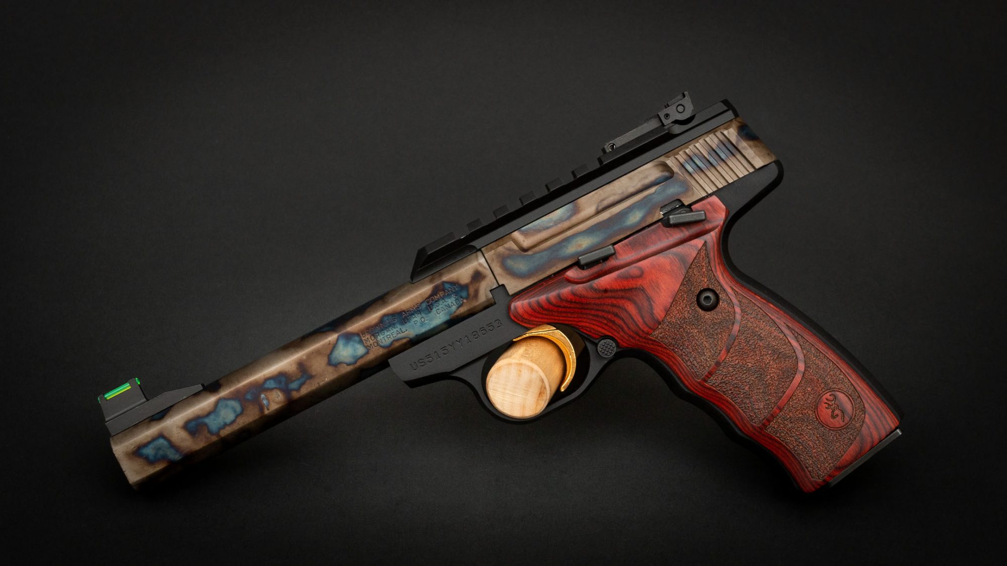 Browning Buck Mark Plus Rosewood UDX with Picatinny Top Rail in 22 LR, featuring bone charcoal color case hardening by Turnbull Restoration Co.