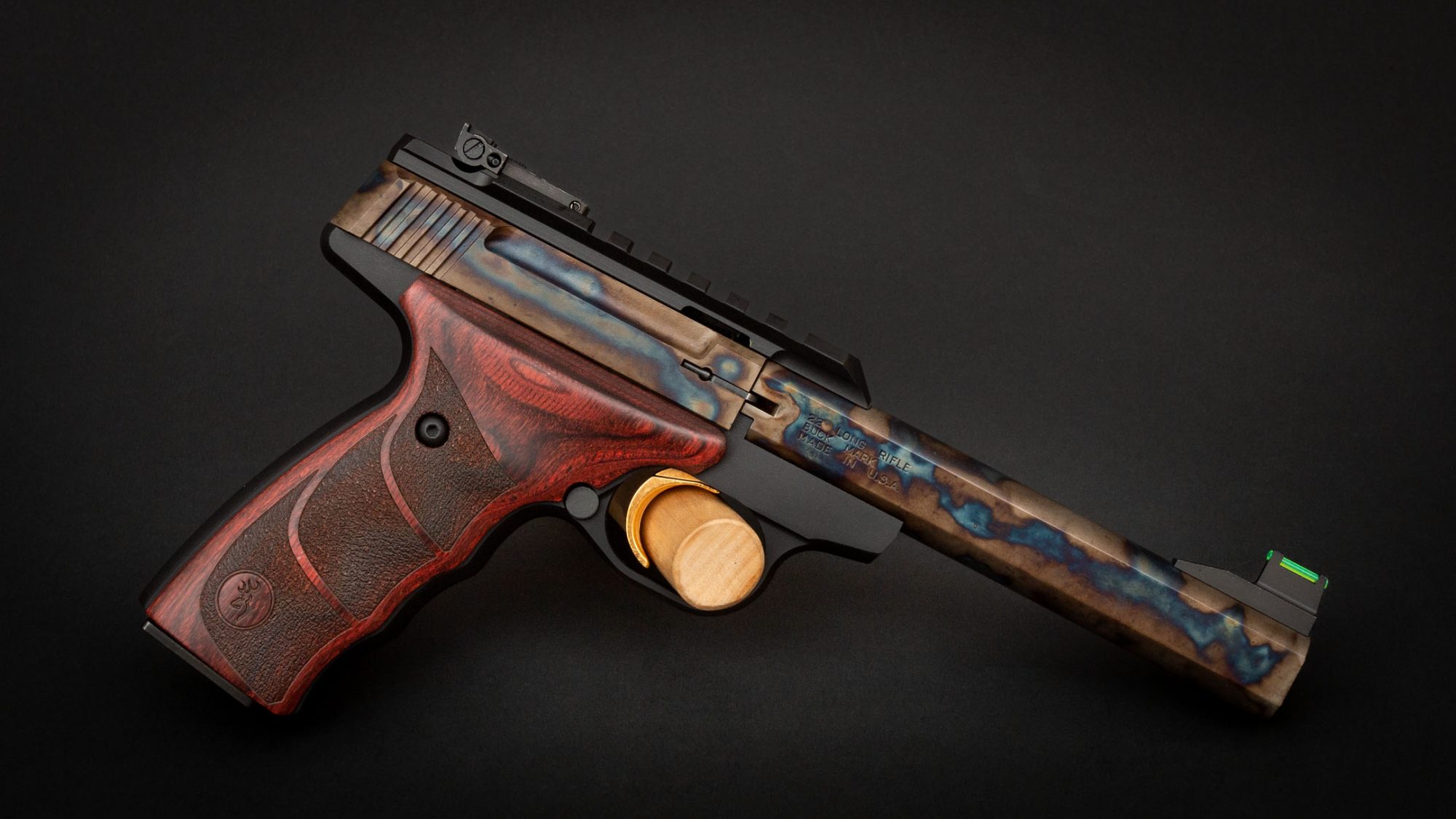 Browning Buck Mark Plus Rosewood UDX with Picatinny Top Rail in 22 LR, featuring bone charcoal color case hardening by Turnbull Restoration Co.
