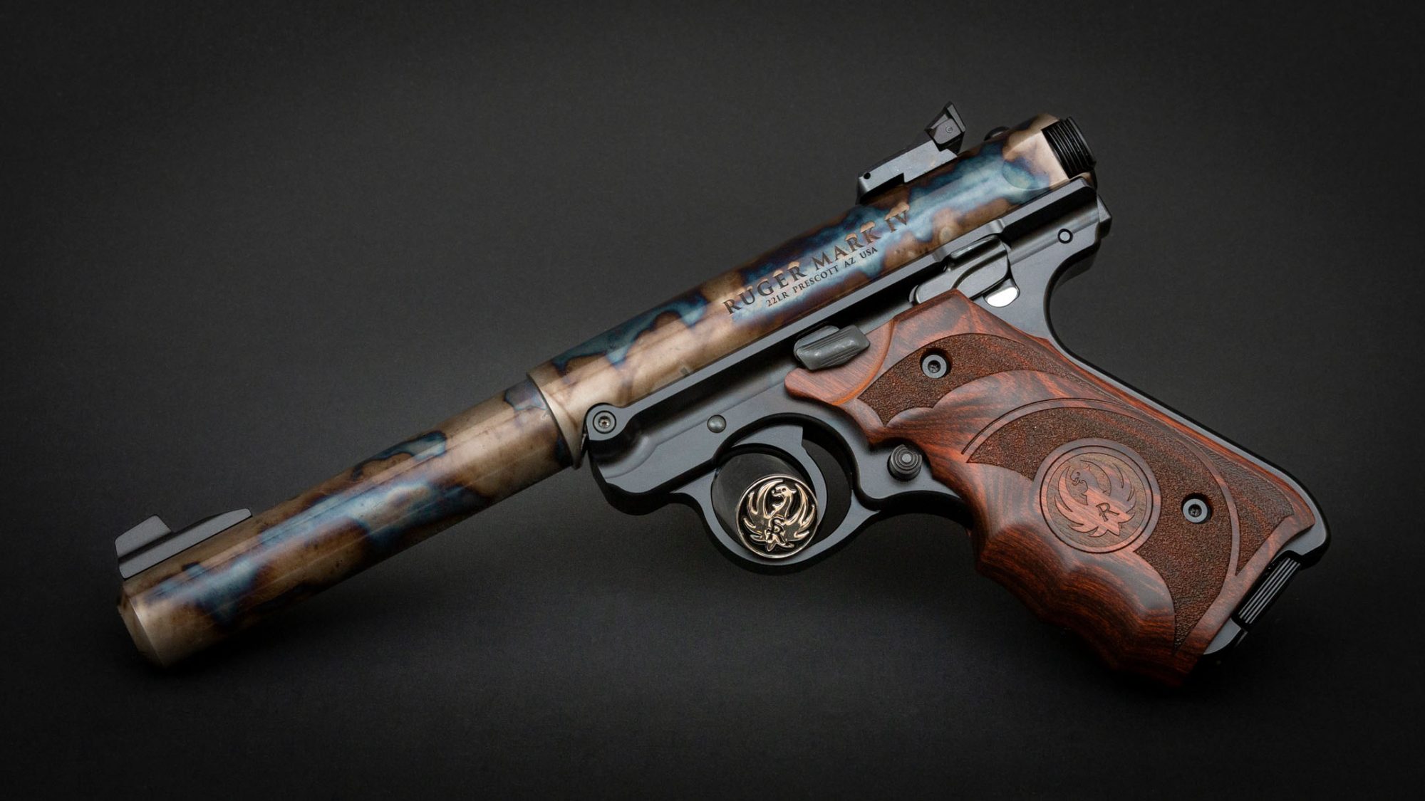 Ruger Mark IV Target with wood laminate grips, featuring bone charcoal color case hardening by Turnbull Restoration