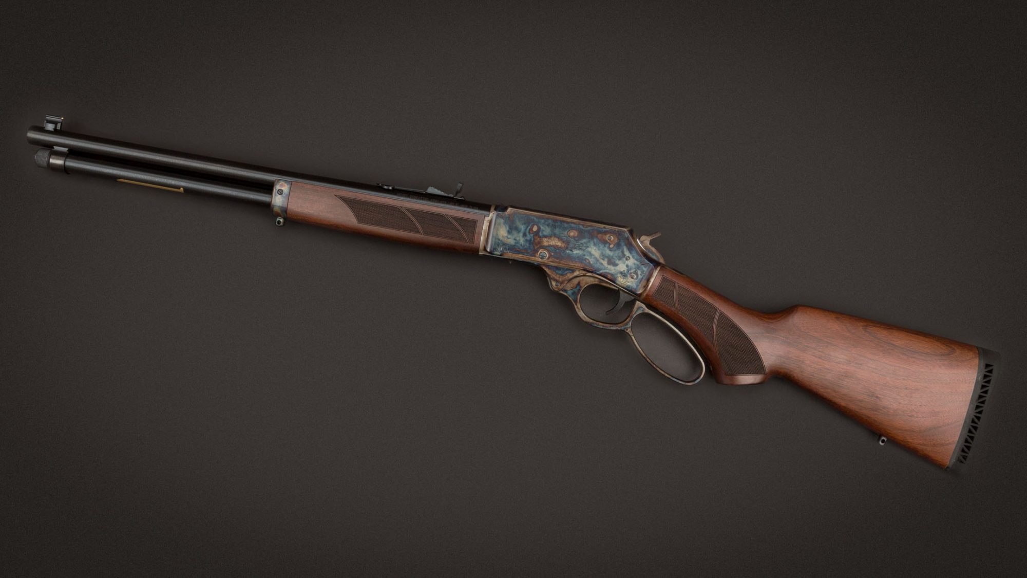 Henry Model H010G rifle, featuring engraving and bone charcoal color case hardening by Turnbull Restoration