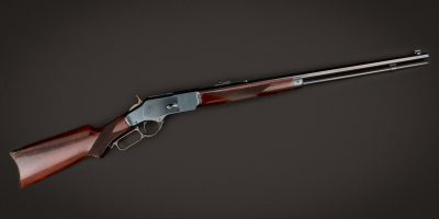 Winchester 1873 featuring engraving, wood finish, and metal finishes by Turnbull Restoration